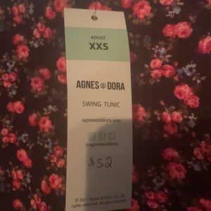 XS/Medium black dress with rose pattern.